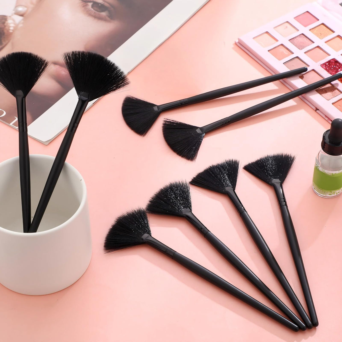 Maitys Facial Fan Brushes displayed with brush covers