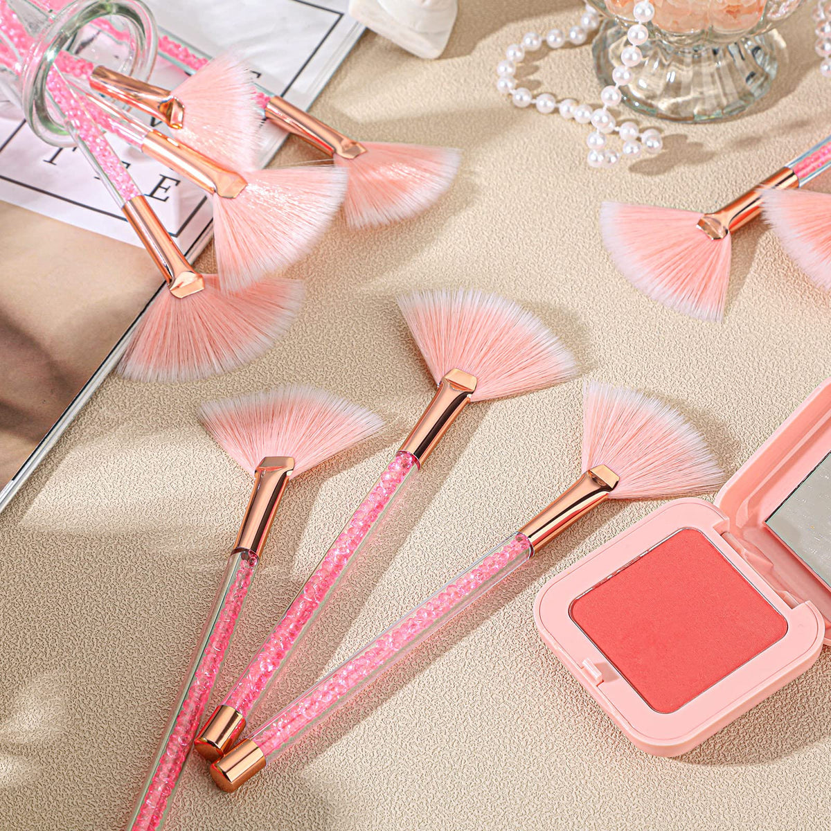 Maitys facial fan brushes in a cosmetic bag