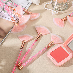 Maitys facial fan brushes in a cosmetic bag