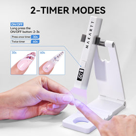 Makartt Handheld UV Nail Lamp in use with nails being