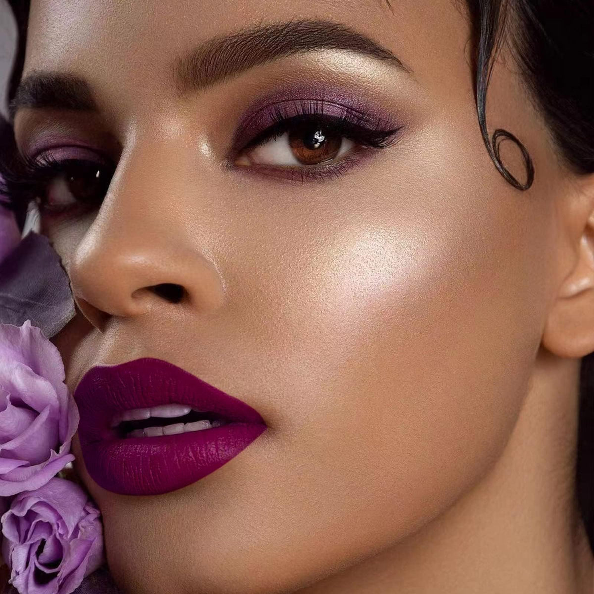 MAKI YIKA purple liquid lipstick tube close-up