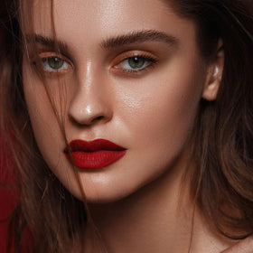 MAKI YIKA red matte liquid lipstick tube close-up