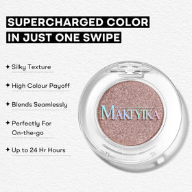 MAKI YIKA Taupe Creme Eyeshadow on a makeup brush
