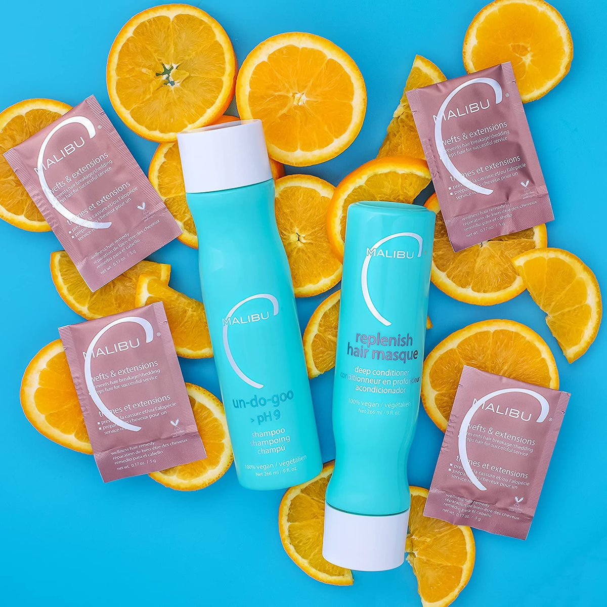 Malibu C Un-Do-Goo Clarifying Shampoo 9 oz on a vanity