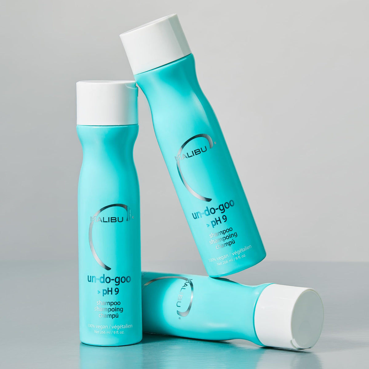 Malibu C Un-Do-Goo Clarifying Shampoo 9 oz with water droplets