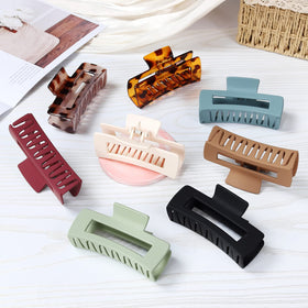 Mandydov large hair claw clip in leopard khaki colour flat lay