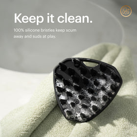 MANSCAPED Scalp Buffer in shower setting
