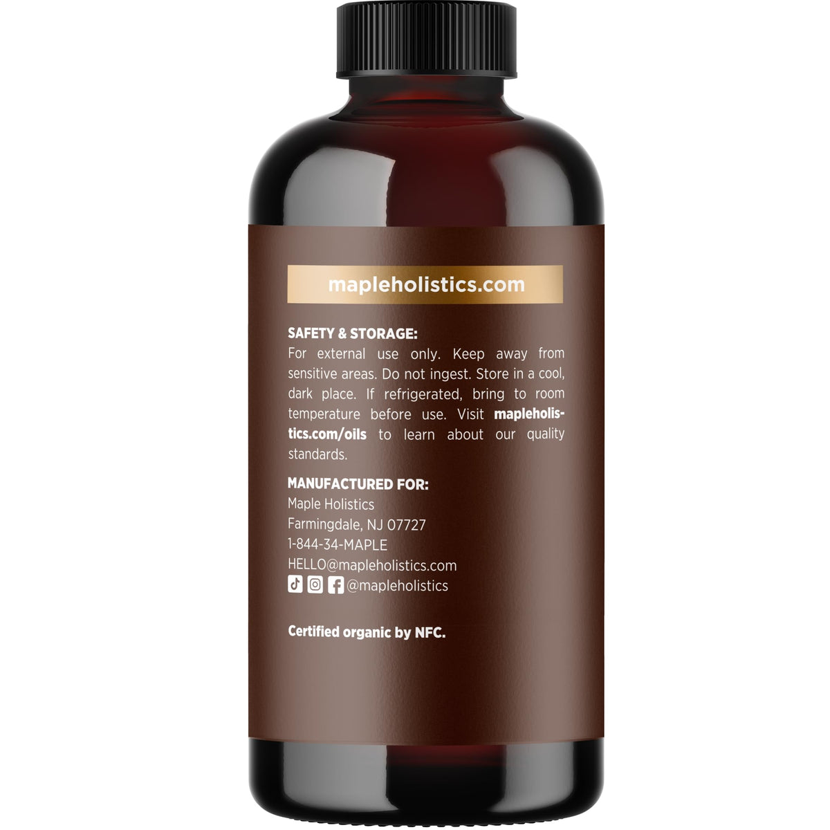 Maple Holistics Organic Castor Oil on a wooden surface