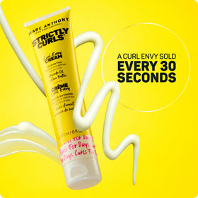 Marc Anthony Curl Envy Cream packaging on a bathroom counter