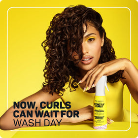 Marc Anthony Curl Refresher Spray mist application on curls