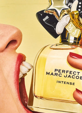 Marc Jacobs Perfect Intense Eau de Parfum bottle with floral background
