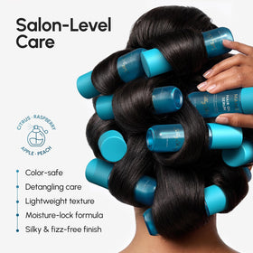 MAREE Hair Oil 50ml on a bathroom counter with hairbrush