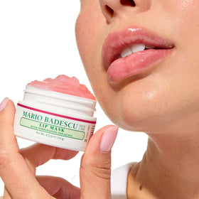 Mario Badescu Lip Mask 0.5oz on a bedside table