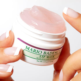 Mario Badescu Lip Mask with a background of vanilla pods