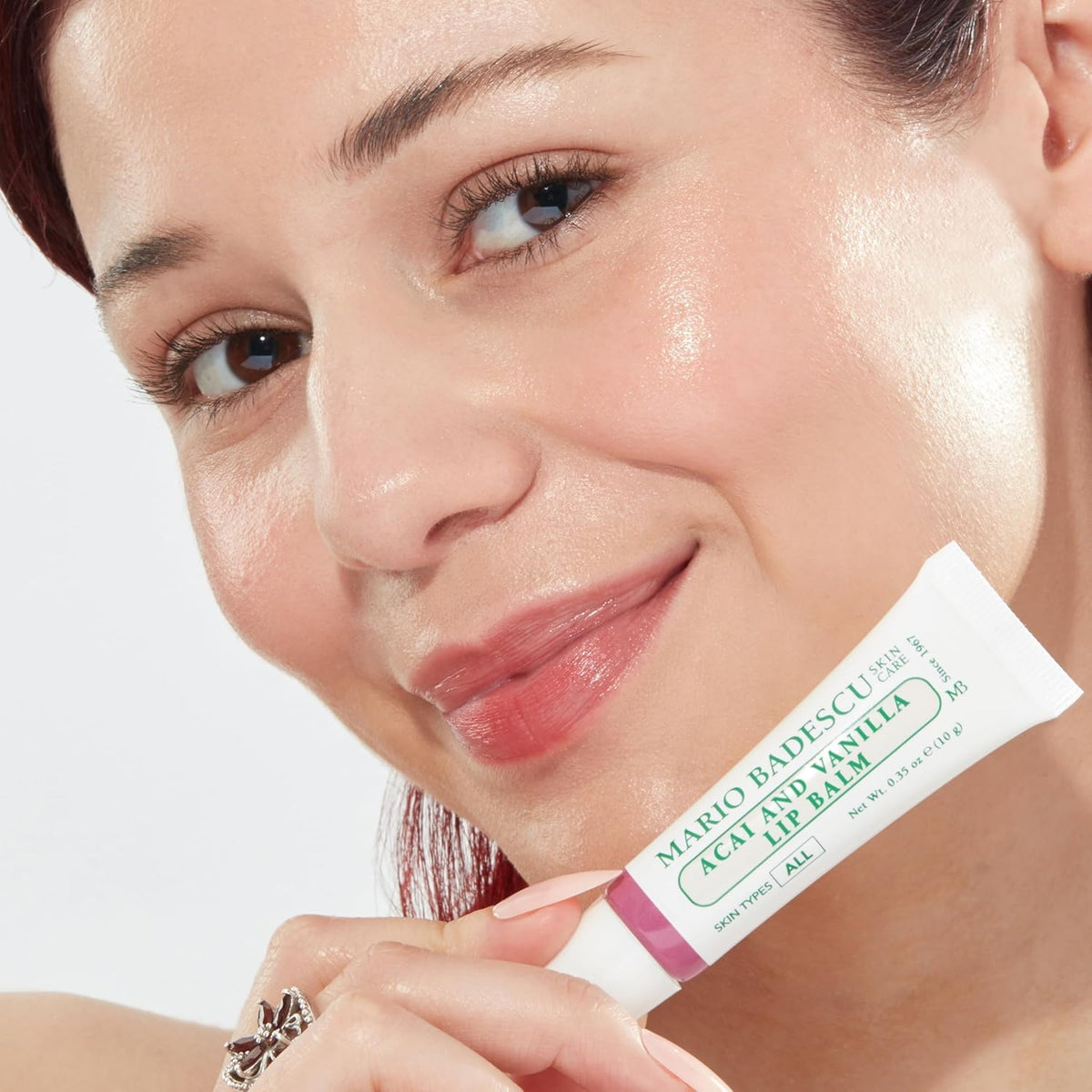 Mario Badescu Moisturising Acai and Vanilla Lip Balm on a wooden surface