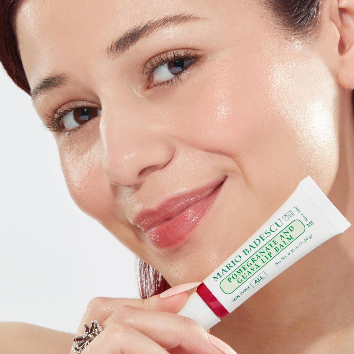 Mario Badescu Pomegranate & Guava Lip Balm squeezed out on hand