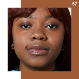 MAYBELLINE Fit Me Liquid Concealer Walnut in use on skin