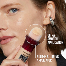 MAYBELLINE Instant Age Rewind Eraser Foundation with SPF 20 displayed on a vanity
