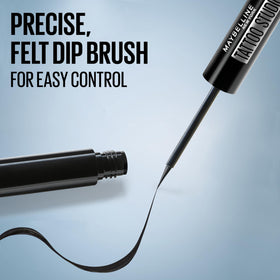 MAYBELLINE Tattoo Studio Dip-Ink Liquid Eyeliner in use on model
