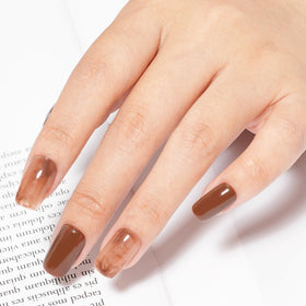MAYCHAO 15ML Brown Gel Nail Polish in a nail art setup
