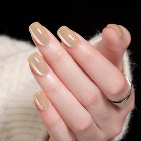 MAYCHAO Cat Eye Gel Nail Polish Champagne Gold application on nails