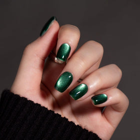 MAYCHAO Cat Eye Gel Nail Polish green polish applied on nails