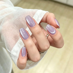 MAYCHAO Cat Eye Gel Nail Polish Violet application on nails