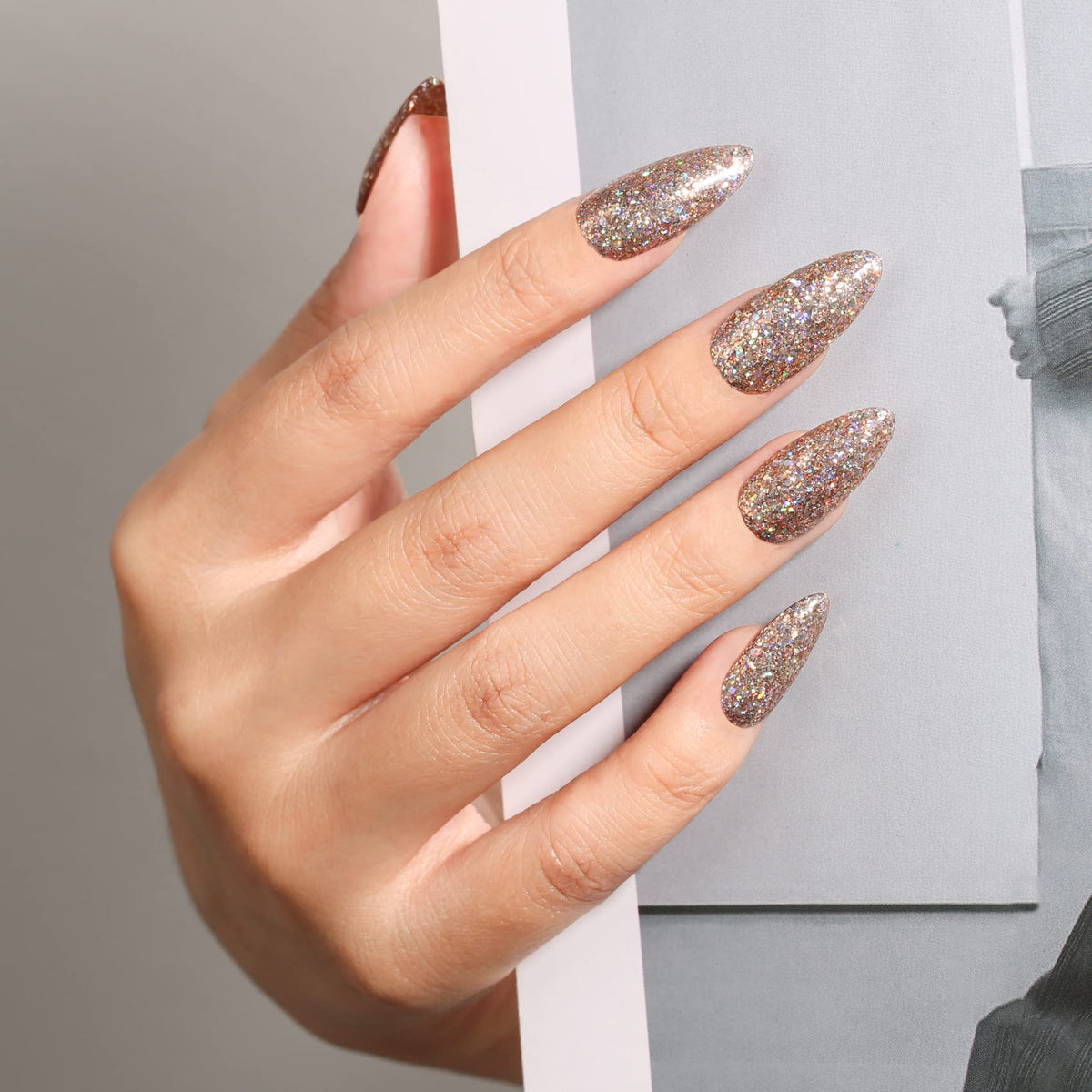 MAYCHAO Champagne Glitter Gel Nail Polish on painted nails