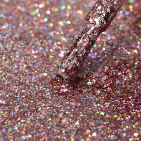 MAYCHAO Gel Nail Polish Clear Pink Glitter curing under LED light