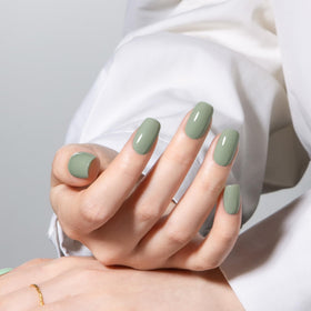 MAYCHAO Gel Nail Polish Emerald Olive Green in a nail art setup