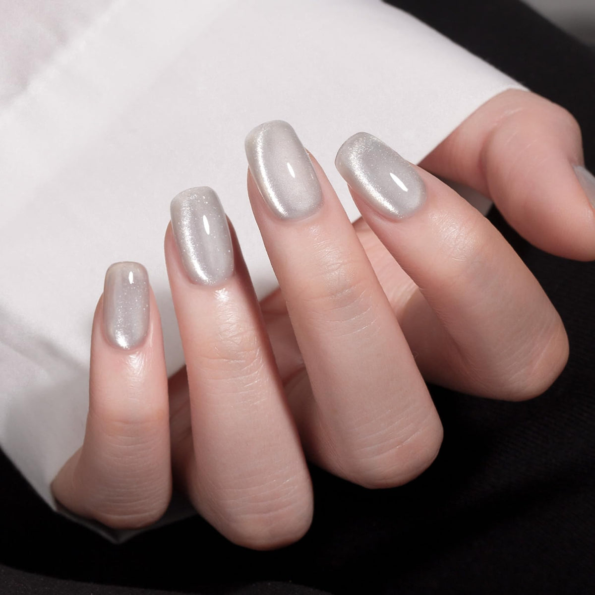 MAYCHAO Silver Cat Eye Gel Nail Polish applied on nails