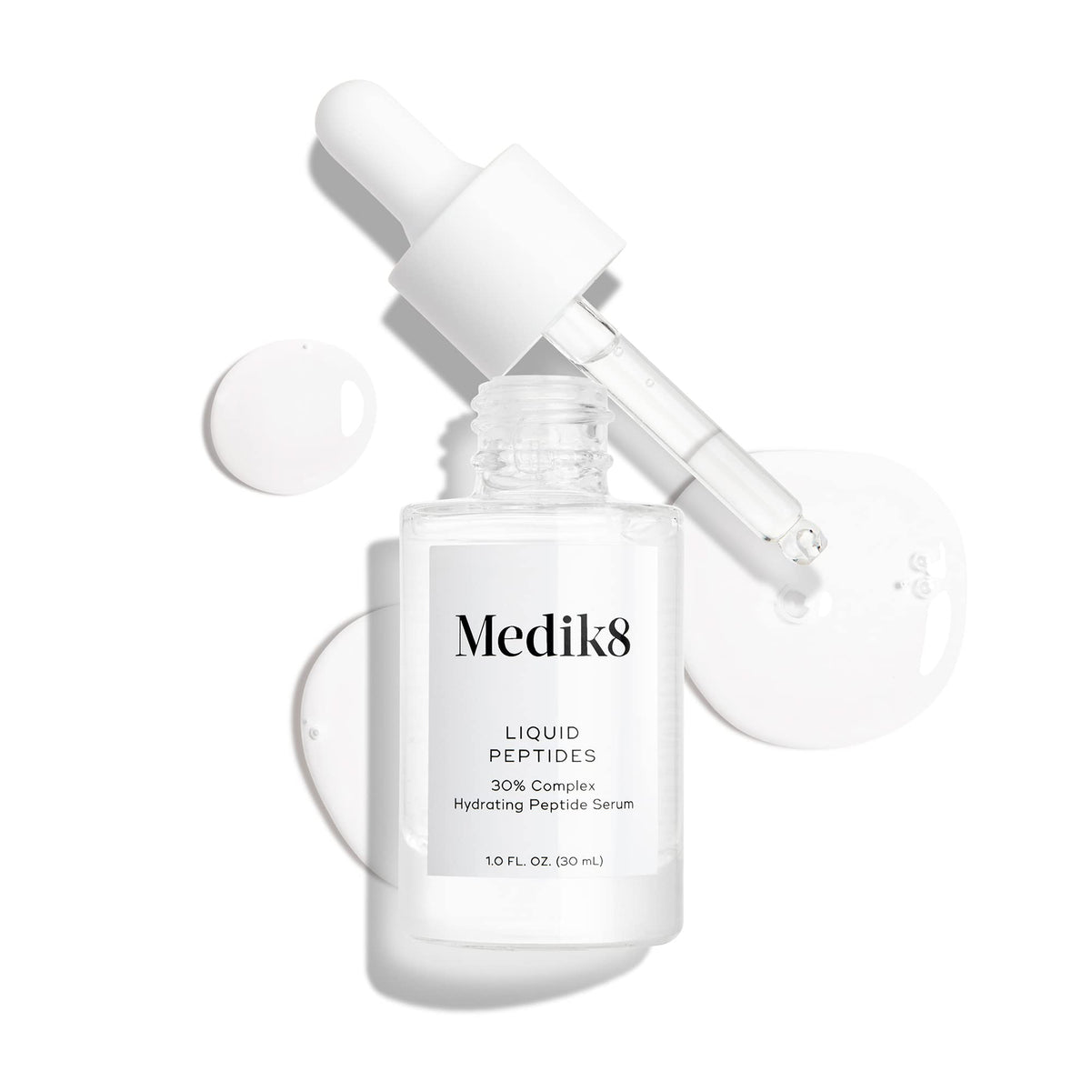 Medik8 Liquid Peptides Serum with dropper dispensing serum