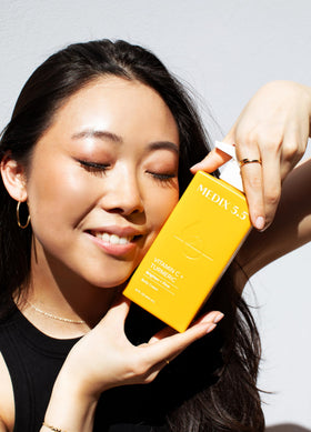 Medix 5.5 Vitamin C Cream Body Lotion in use outdoors