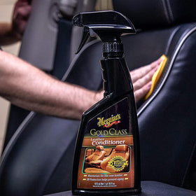 Meguiar's Gold Class Leather Conditioner Spray with car interior background