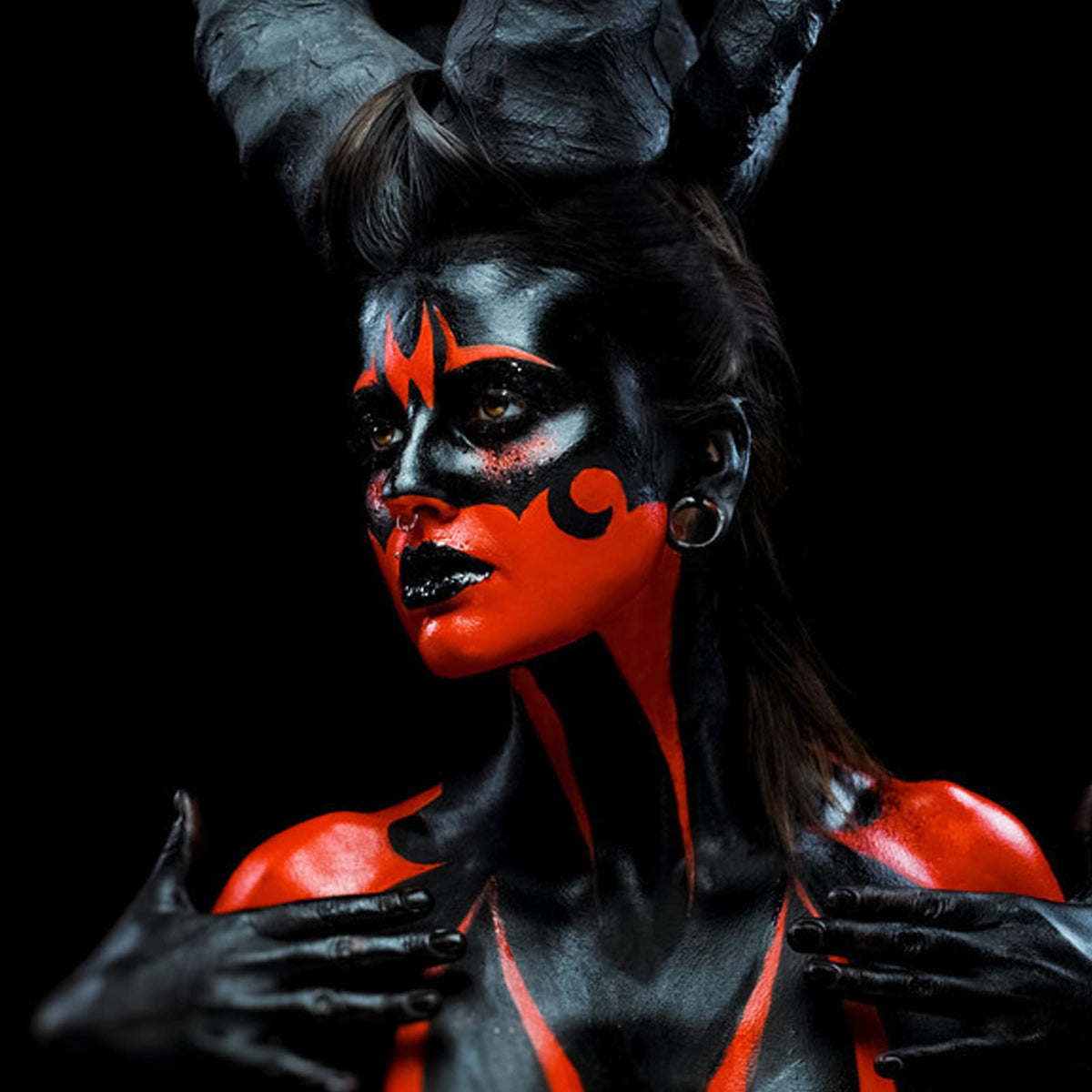 MEICOLY Devil Red Face Body Paint Stick in use for Halloween makeup