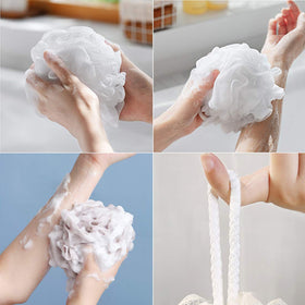 Meirrnyyu bath loofah sponge held in hand for size reference