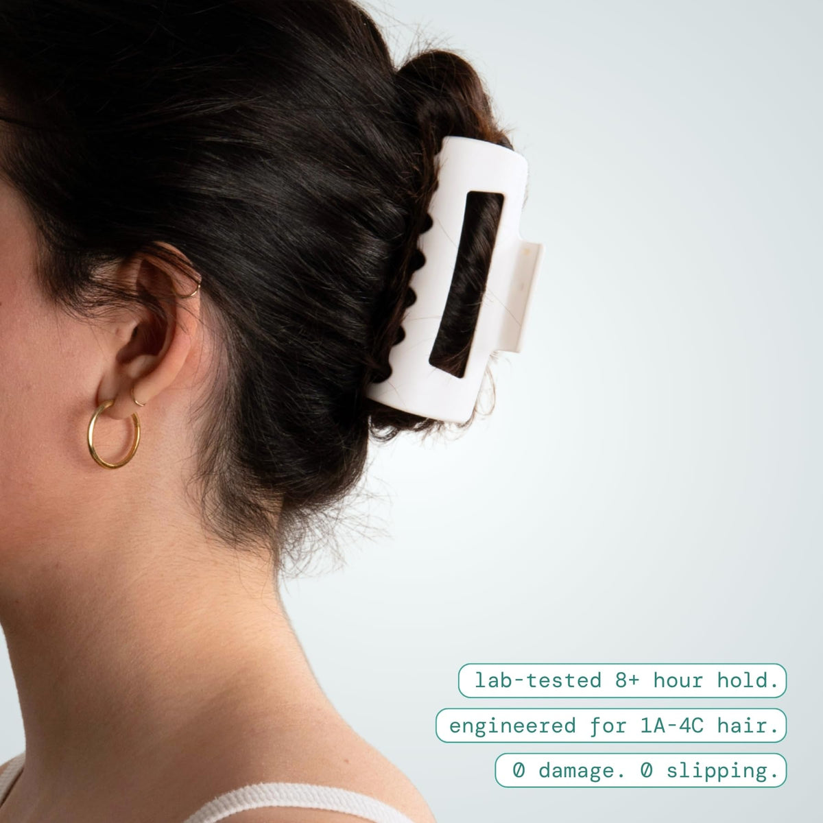 MELLO Medium Hair Clip on a woman's hair styled up