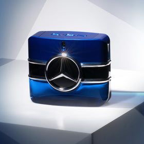 Mercedes Benz Sign Eau de Parfum bottle with flowers
