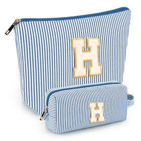 mibasies blue cosmetic bag front view with alphabet design