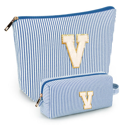 mibasies blue cosmetic bag front view with alphabet letters