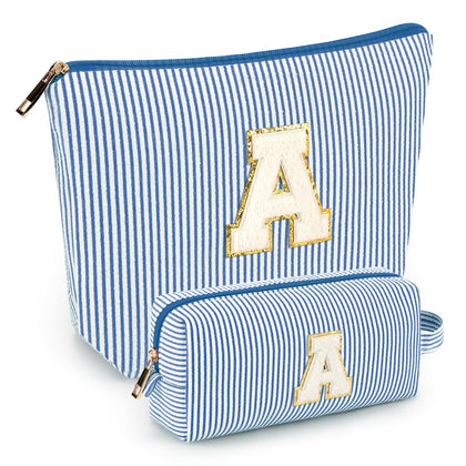 mibasies initial makeup bag blue model front view
