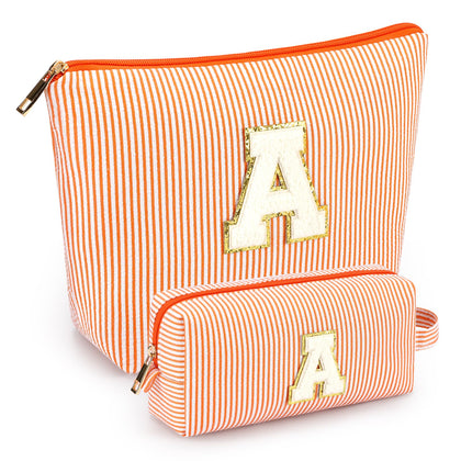 mibasies Initial Makeup Bags in orange with letters front view