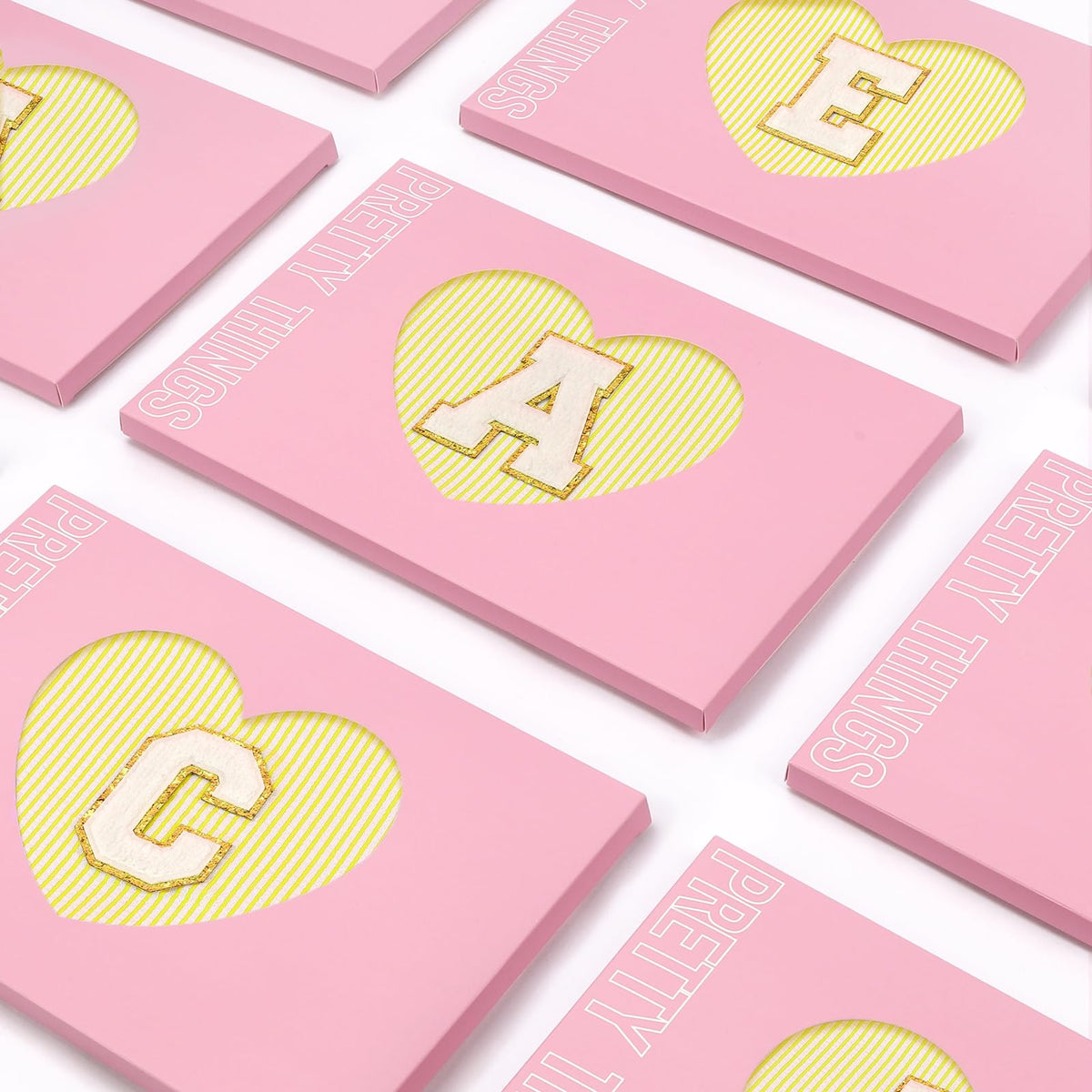 mibasies small pink cosmetic bag with pens and makeup