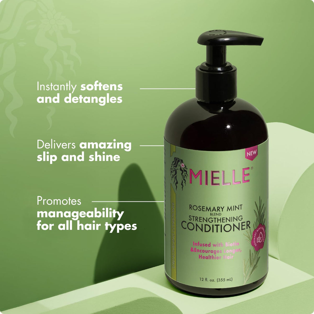 Mielle Organics Rosemary Mint Conditioner with rosemary and mint leaves