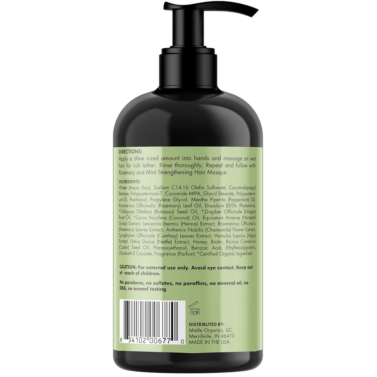 Mielle Organics Rosemary Mint Shampoo on a wooden surface