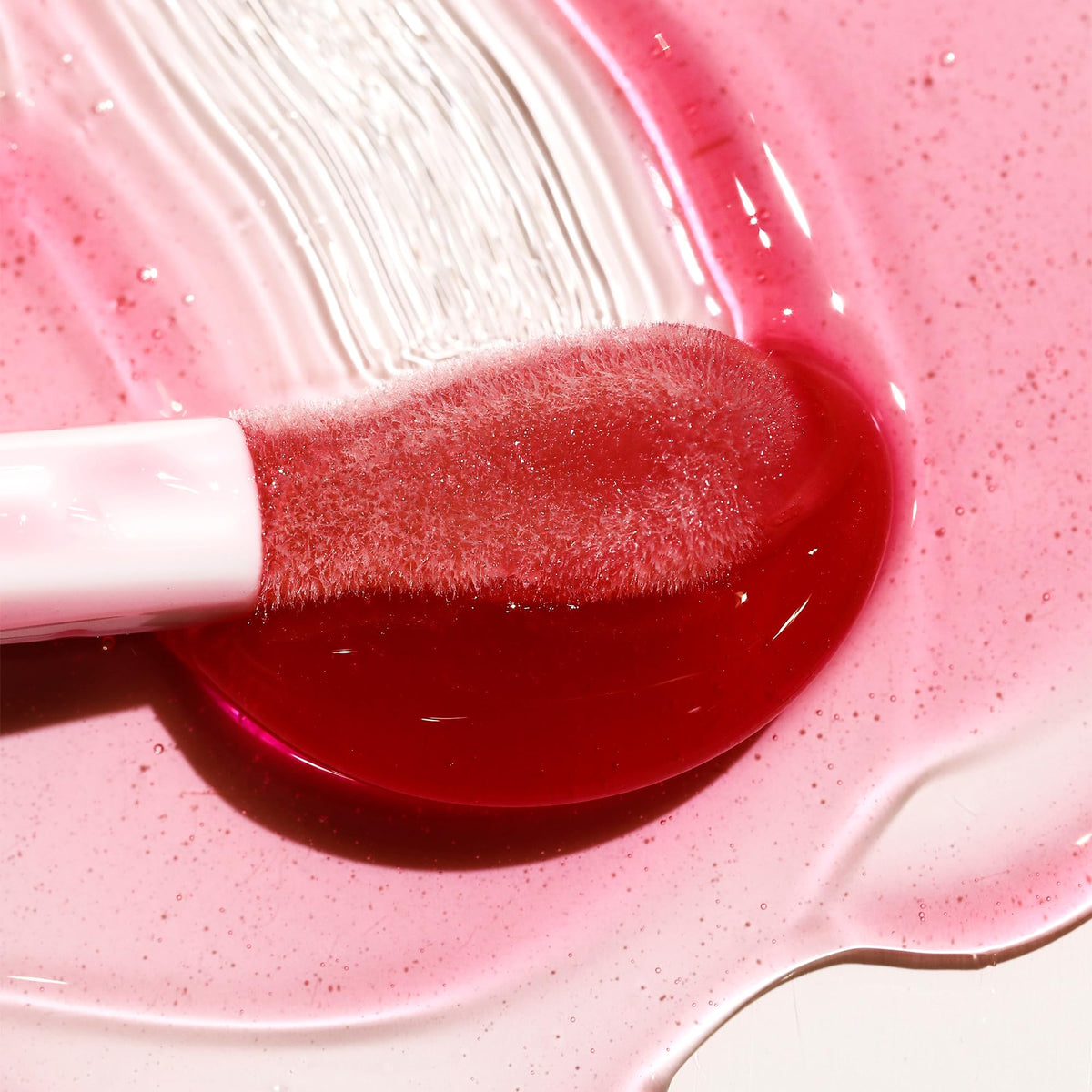 Milani Fruit Fetish Lip Oil Raspberry Peach with fruit extracts