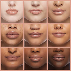Milani Keep It Full Lip Plumper Champagne on a makeup table