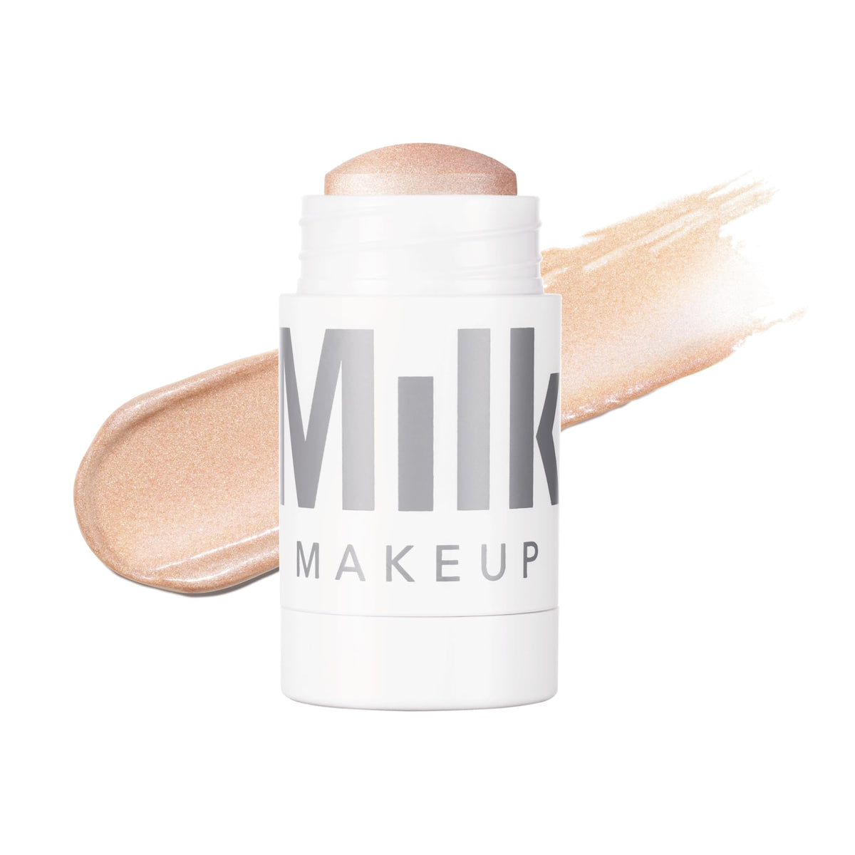 Milk Makeup Highlighter Stick in Turnt (Golden Peach) front view