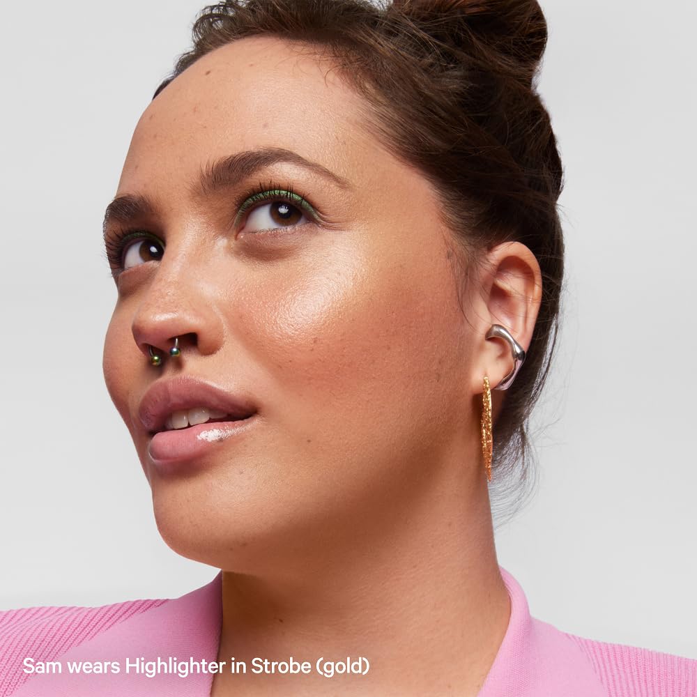 Milk Makeup Highlighter Stick on collarbones for a luminous look