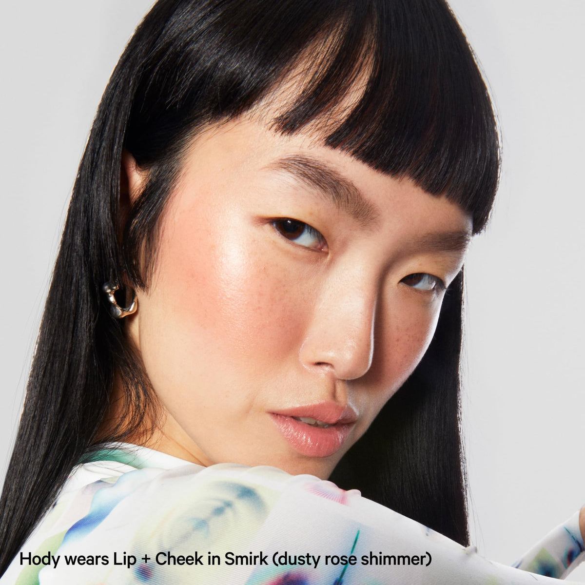Milk Makeup Lip + Cheek Stick displayed with other Milk Makeup products